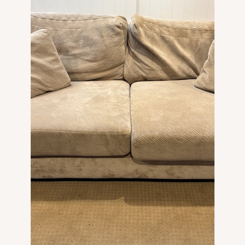 Used Large Beige Microfiber Sofa w Matching Ottoman for sale on AptDeco