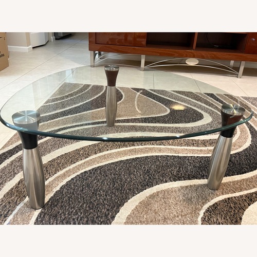 Used Triangle Glass Coffee Table for sale on AptDeco