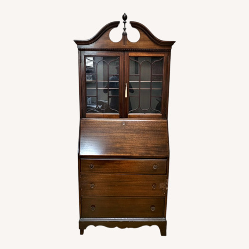 Used Vintage/Antique Dark Brown Wood Armoire for sale on AptDeco