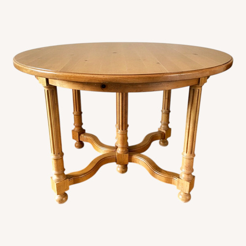 Used Milling Road Extendable Round Wood Dining Table for sale on AptDeco