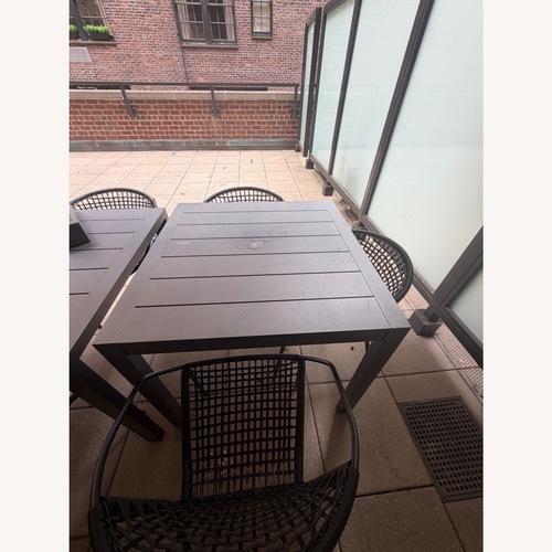 Used Restoration Hardware Aegean Dark Gray Metal Dining Table for sale on AptDeco