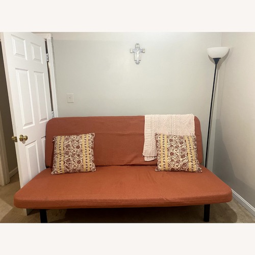Used IKEA Nyhamn Sleeper Sofa Red/Brown for sale on AptDeco