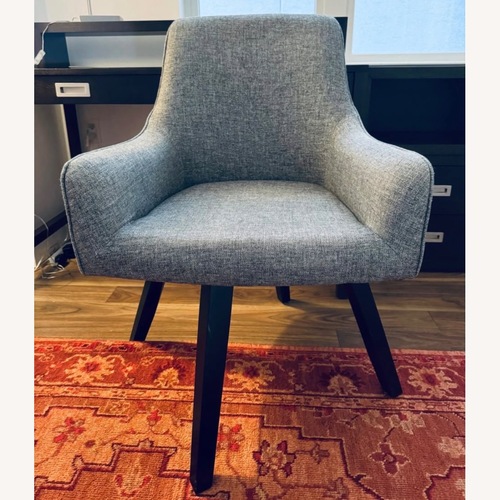 Used Crate & Barrel Harvey Black Swivel Armchair  for sale on AptDeco