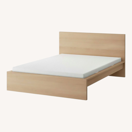 Used IKEA Malm Yellow Wood Queen Bed for sale on AptDeco