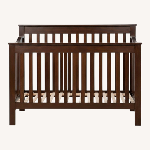 Used Dark Brown Wood Crib for sale on AptDeco