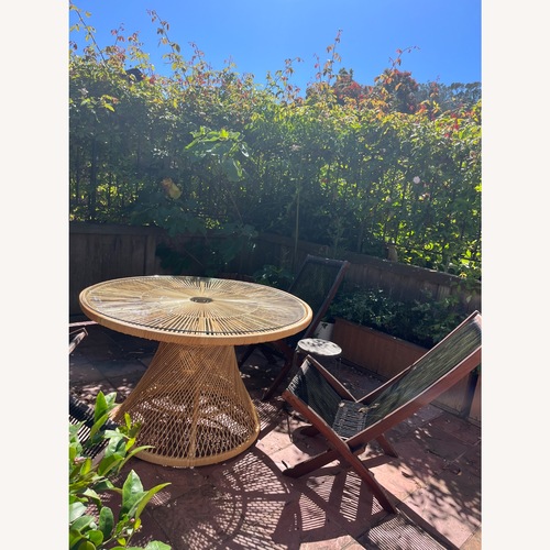 Used Serena & Lily Blithedale Natural Rattan Dining Table for sale on AptDeco