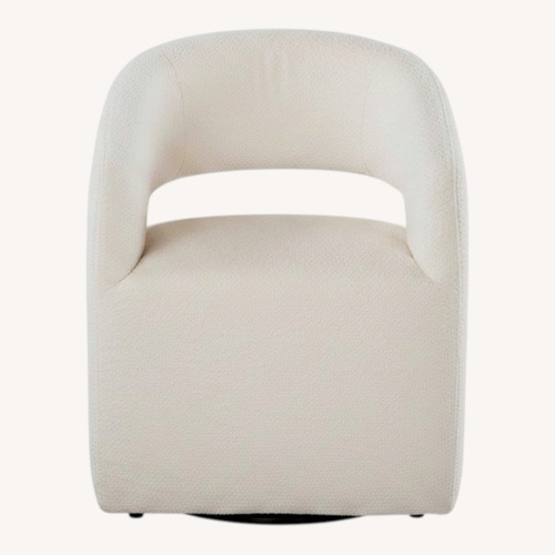Used Basset Aries Upholstered Dining Chair with Casters for sale on AptDeco