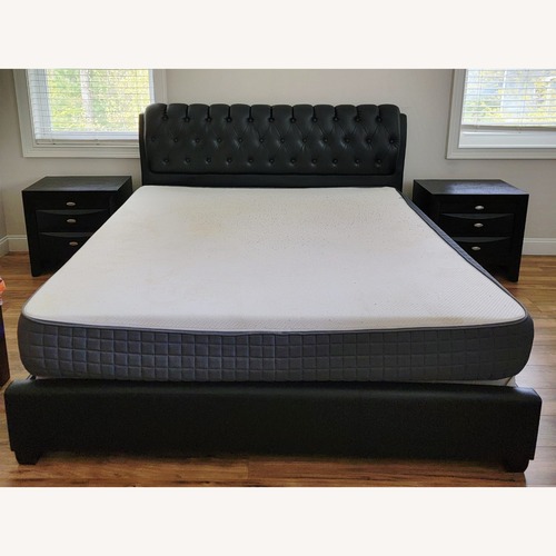 Used Black Faux Leather King Bed for sale on AptDeco