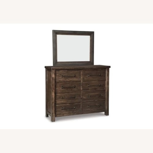 Used Ashley Starmore 8 Drawer Dresser & Mirror  for sale on AptDeco