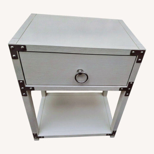 Used White Wood Side Table with Silver Metal Trim for sale on AptDeco
