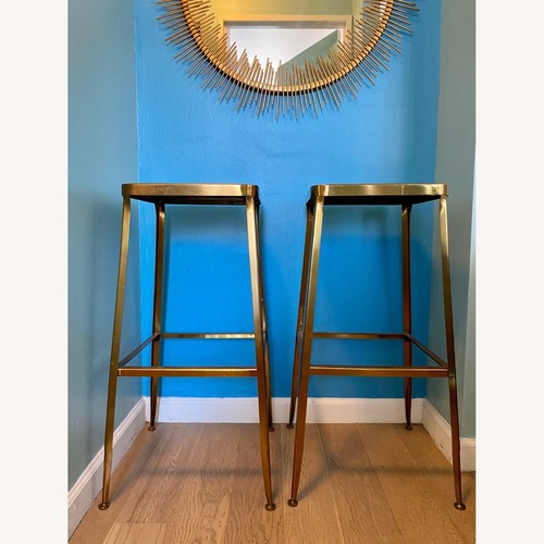 Used CB2 Flint Gold Bar Stools 2 for sale on AptDeco