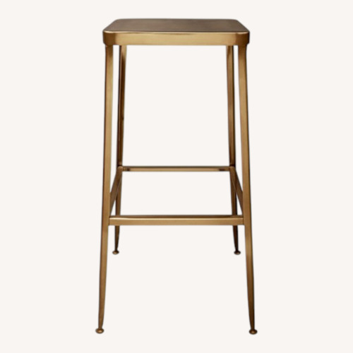 Used CB2 Flint Gold Bar Stools 2 for sale on AptDeco