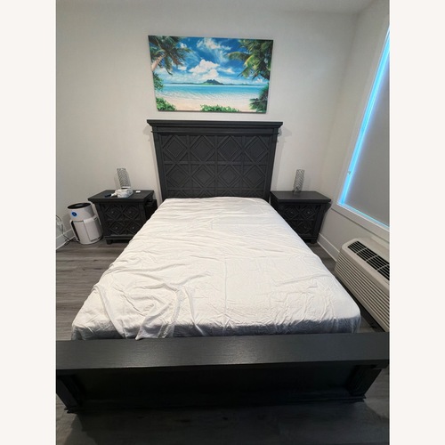 Used Raymour & Flanigan Brighton Blue Wood Queen Bed for sale on AptDeco