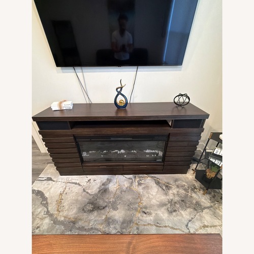 Used Ember Dark Brown Fireplace W Built in Speakers for sale on AptDeco