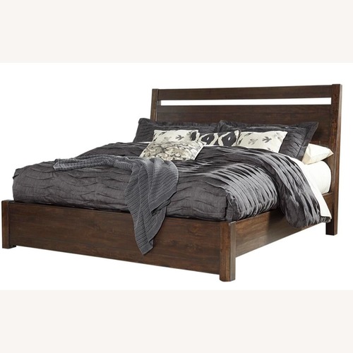 Used Ashley Starmore Queen Panel Bed for sale on AptDeco