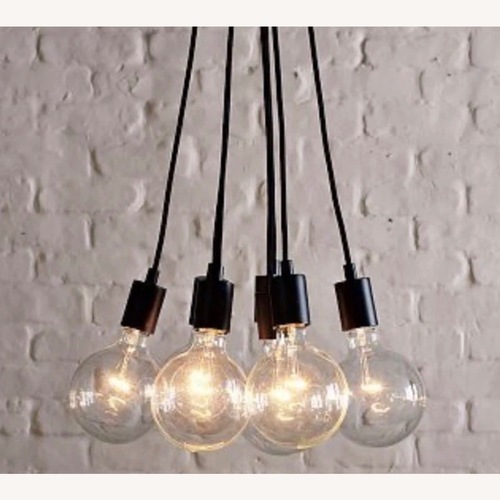 Used West Elm 7-Light Black Industrial Cord Pendant for sale on AptDeco