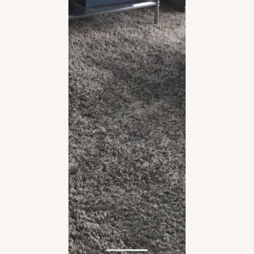 Used Vintage/Antique Dark Brown Area Rug 10' x 10' for sale on AptDeco