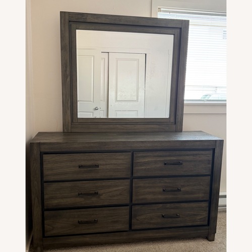 Used Ashley Furniture Dark Brown Wood Dresser for sale on AptDeco