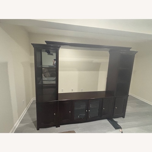 Used Dark Brown Entertainment Center for sale on AptDeco
