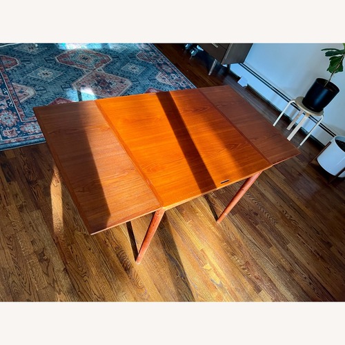 Used Poul Hundevad Furniture Dark Brown Dining Table for sale on AptDeco