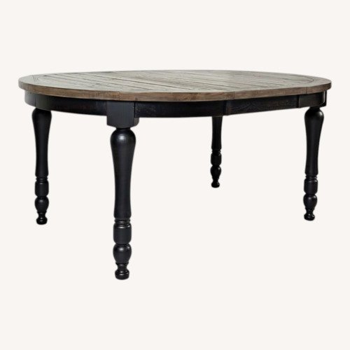 Used Ginger Round to Oval Dining Table for sale on AptDeco