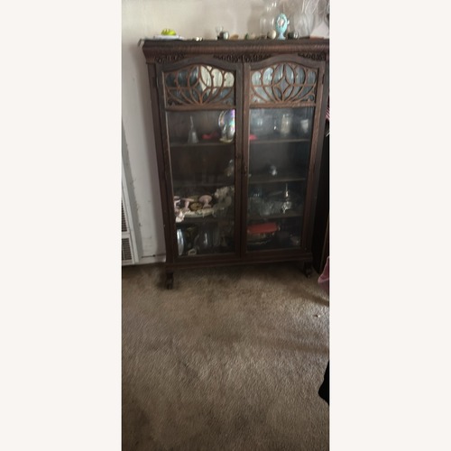 Used Vintage/Antique Dark Brown Wood Armoire for sale on AptDeco