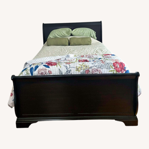 Used Dark Brown Wood Queen Bed for sale on AptDeco