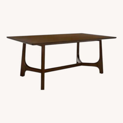 Used Safavieh Couture Dark Brown Wood Dining Table for sale on AptDeco