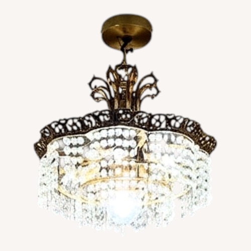 Used Touch of Europe Chandelier for sale on AptDeco