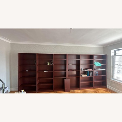 Used Solid Wood Bookshelves Dark Brown for sale on AptDeco