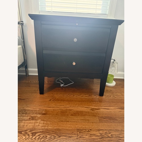 Used Raymour & Flanigan Black Wood Nightstand for sale on AptDeco