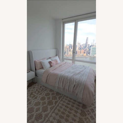 Used Amazon Queen Size Storage Bed Frame for sale on AptDeco