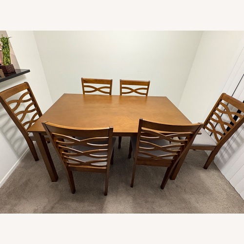Used Dining Table with 6 Chairs for sale on AptDeco