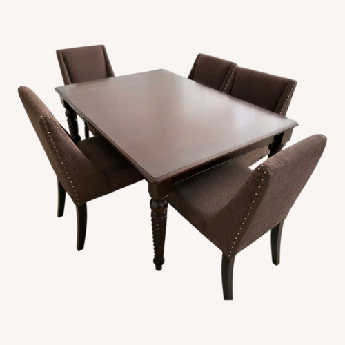 Used Extendable Solid Wood Dining Table Set for sale on AptDeco