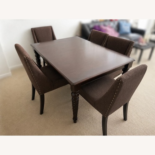 Used Extendable Solid Wood Dining Table Set for sale on AptDeco