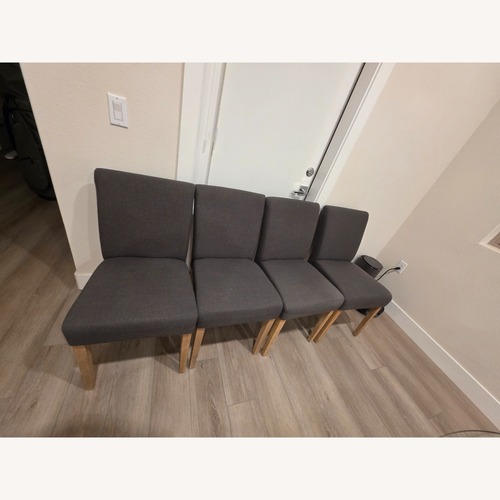 Used Crate & Barrel Dark Gray Wood Dining Chairs for sale on AptDeco