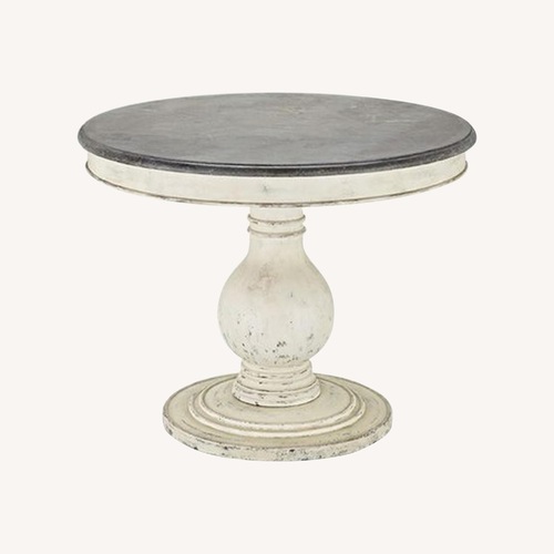 Used Arhaus Luca Blue Stone Dining Table for sale on AptDeco