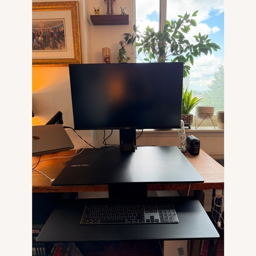 Used Black Wood Desk for sale on AptDeco