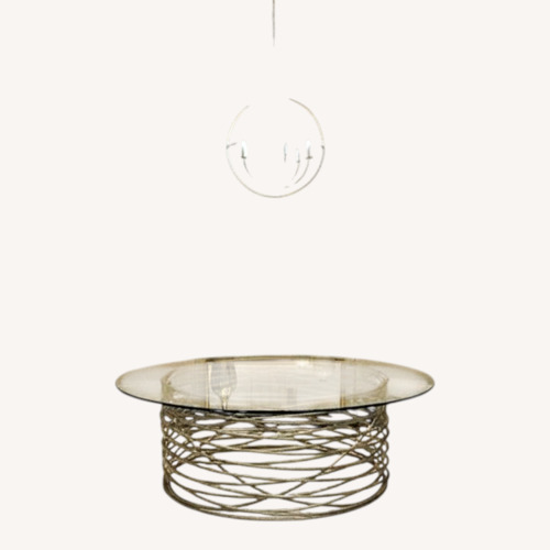 Used Italian Spiral Base Glass Top Dining Table for sale on AptDeco
