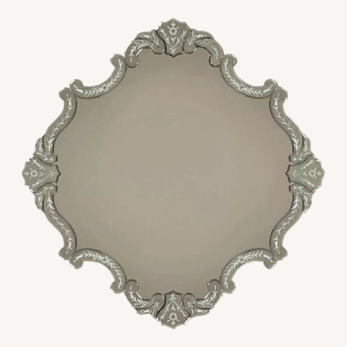 Used Anthropologie Transparent Glass Wall Mirror for sale on AptDeco