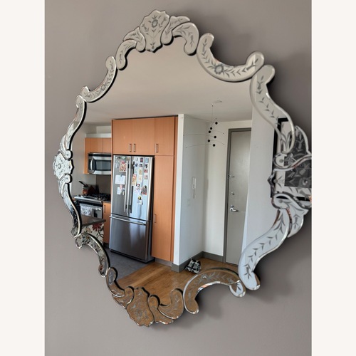 Used Anthropologie Transparent Glass Wall Mirror for sale on AptDeco