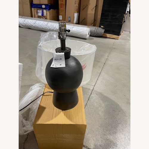 Used Four Hands Black Ceramic Table Lamps for sale on AptDeco