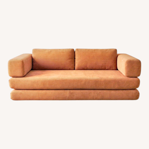 Used Orange Cotton Futon for sale on AptDeco
