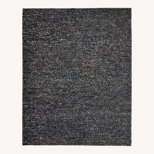 Used Crate & Barrel Orly Black Wool Area Rug 10' x 14' for sale on AptDeco