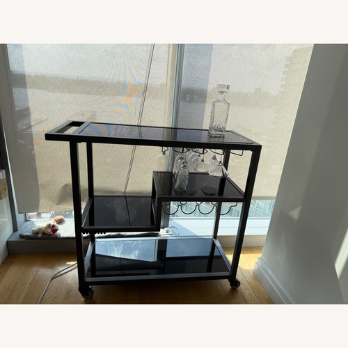Used Black Glass Bar Cart for sale on AptDeco