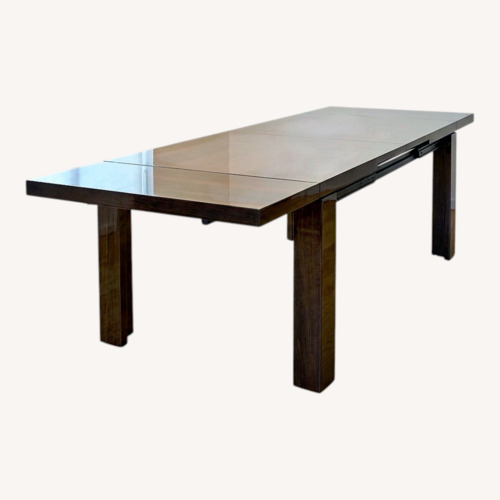 Used Dark Brown Wood Dining Table for sale on AptDeco