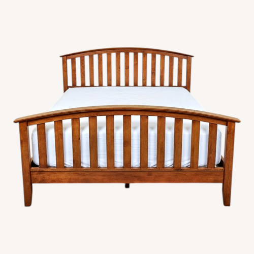 Used Palisade Furniture Natural Wood King Bed Frame for sale on AptDeco