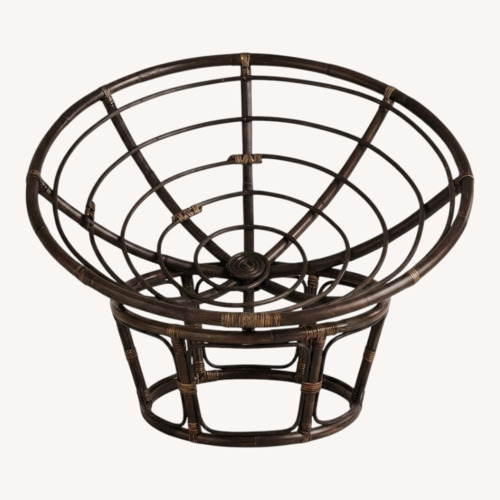 Used World Market Papasan Chair with Faux Fur Cushion for sale on AptDeco
