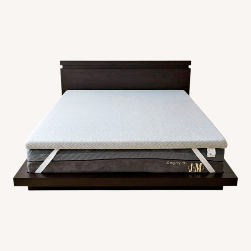 Used J&M Furniture Black King Bed for sale on AptDeco
