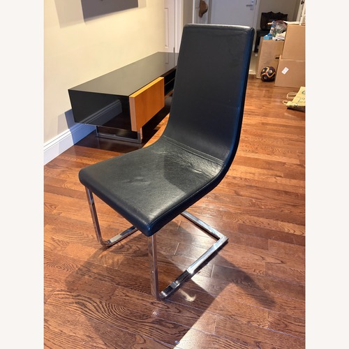 Used Calligaris Black Leather Dining Chairs for sale on AptDeco